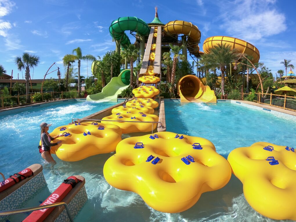 Rafts at Volcano Bay being hauled up using nifty conveyor belts - Everything You Need to Know For the Perfect Day at Volcano Bay