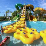 Rafts at Volcano Bay being hauled up using nifty conveyor belts - Everything You Need to Know For the Perfect Day at Volcano Bay