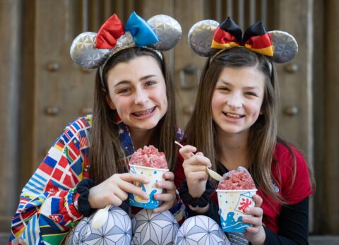 Sisters enjoy Kakigōri shaved ice treats in the Japan Pavilion of Epcot World Showcase -- this ultimate guide to all the top sweet treats, savory snacks and best beverages you can find in Epcot’s World Showcase just for you.