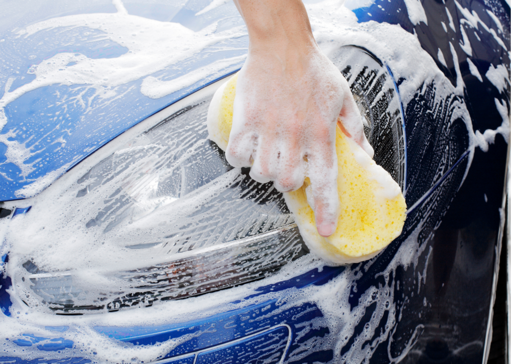 Close up image of hand washing car. Another chore you could offer up for some extra cash is washing the family vehicles in your driveway. Fill up a bucket with some soap and water, give the kids a sponge and hose and let them have at it.